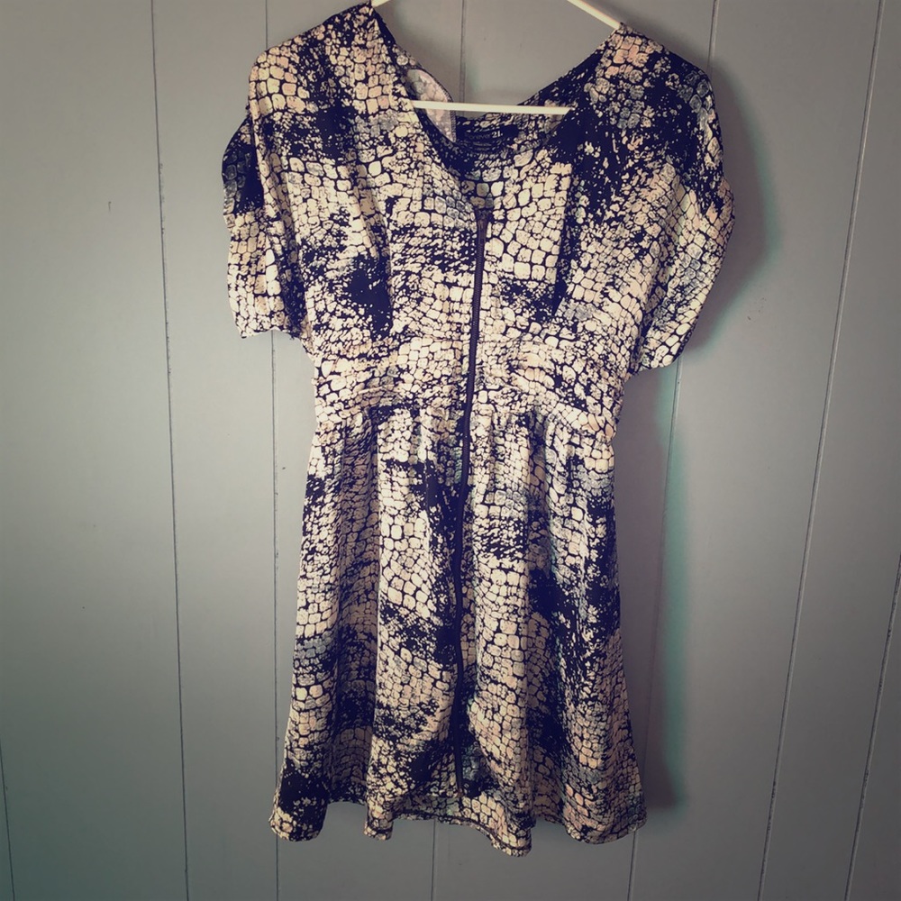 Black and white animal print with full frontal zip